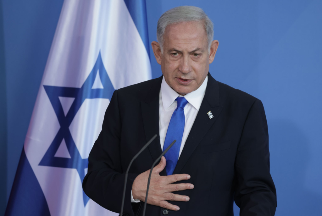 Israeli Prime Minister Benjamin Netanyahu addresses foreign media from the Israeli Defense Ministry in Tel Aviv